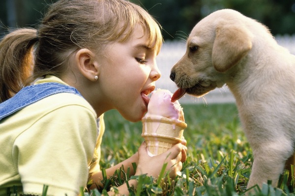 girl and puppy